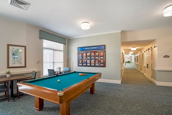 Interior view of a common area with a pool table