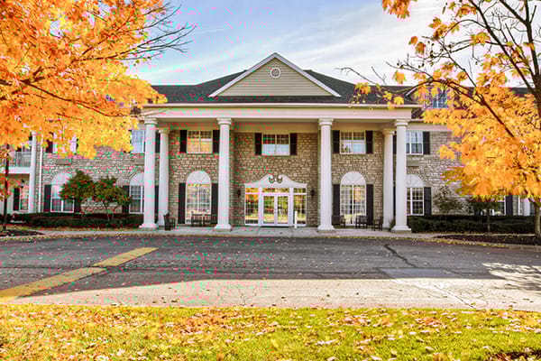 Exterior view of Brookdale Muirfield in autumn