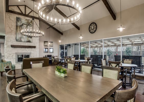 Bright dining room with large windows and modern decor
