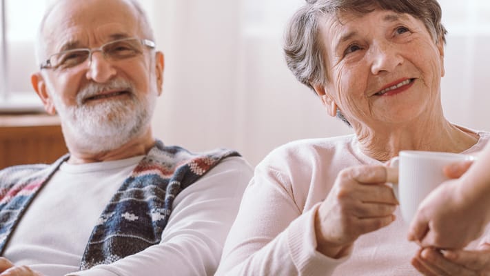Residents enjoying a conversation in a common area