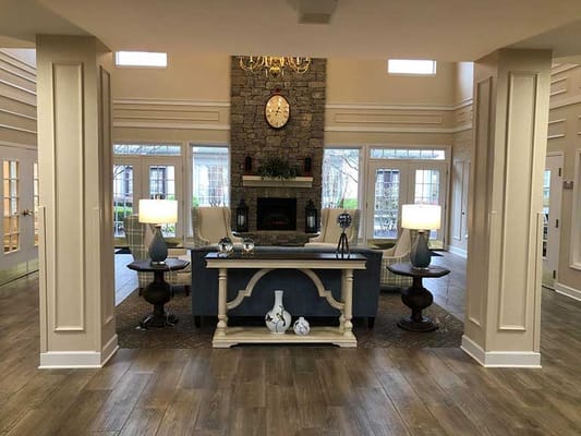 Interior lobby area with a decorative table and seating