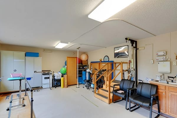 An interior view of a therapy gym with equipment