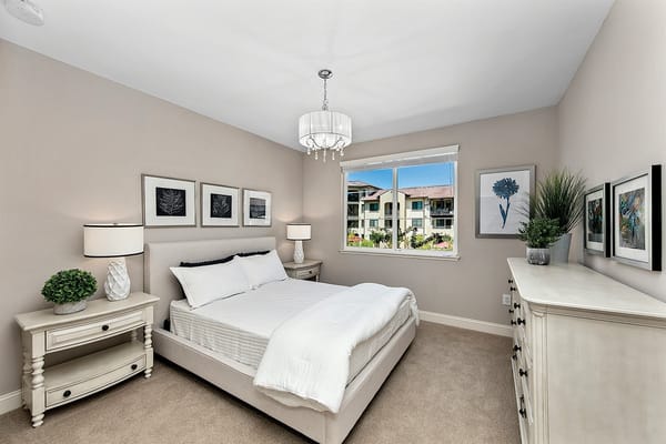 Cozy private bedroom with modern decor and natural light