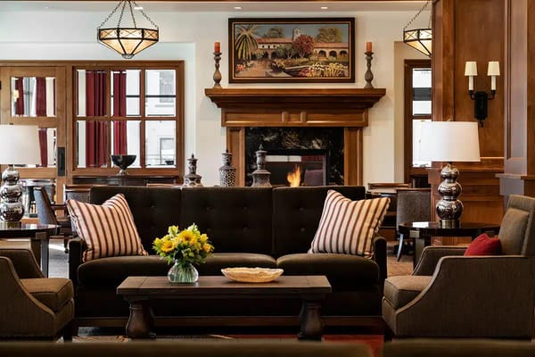 Cozy common area with comfortable seating and a fireplace