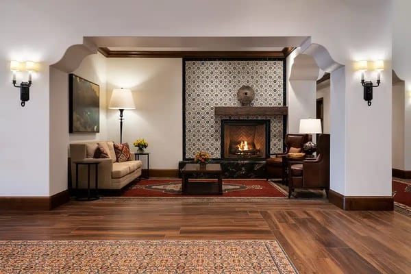 Cozy common area with a fireplace and seating