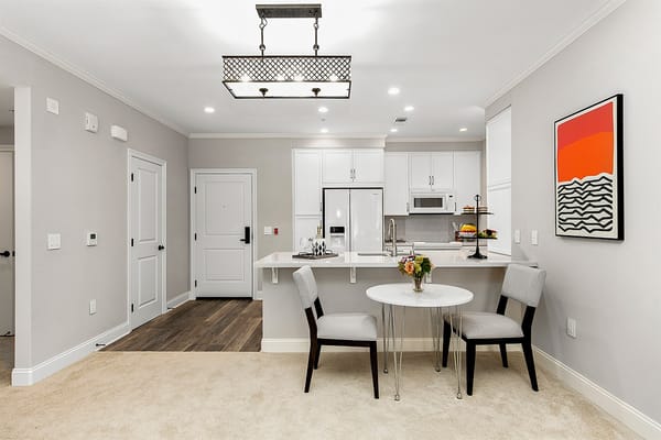 Bright and modern living area with dining table