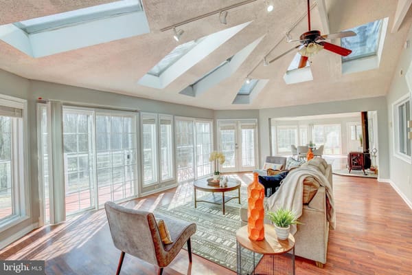Bright common area with skylights and comfortable seating