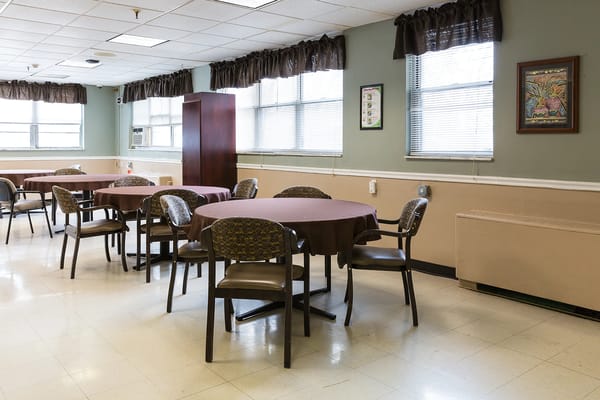 Interior dining room with tables and chairs