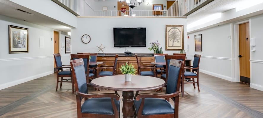 Common area with seating and a television