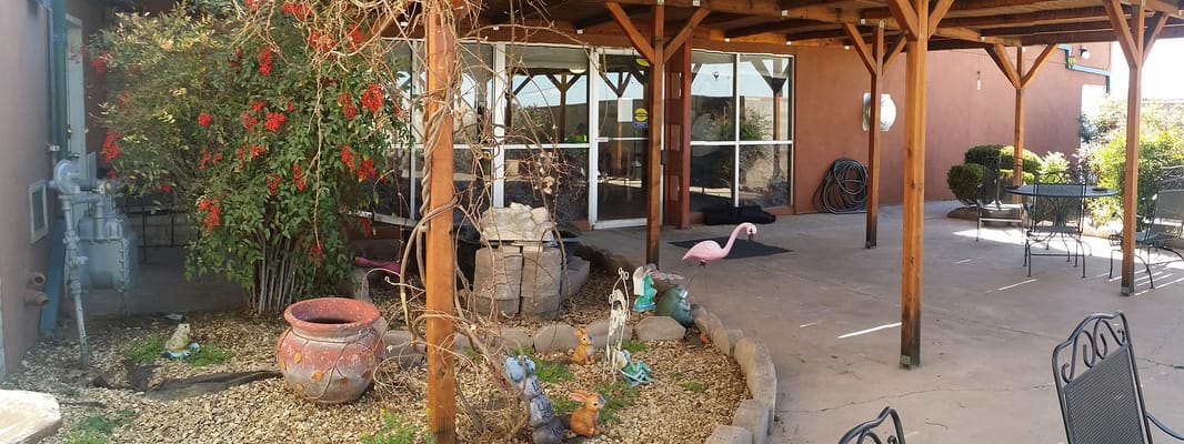 Outdoor patio area with decorations and seating