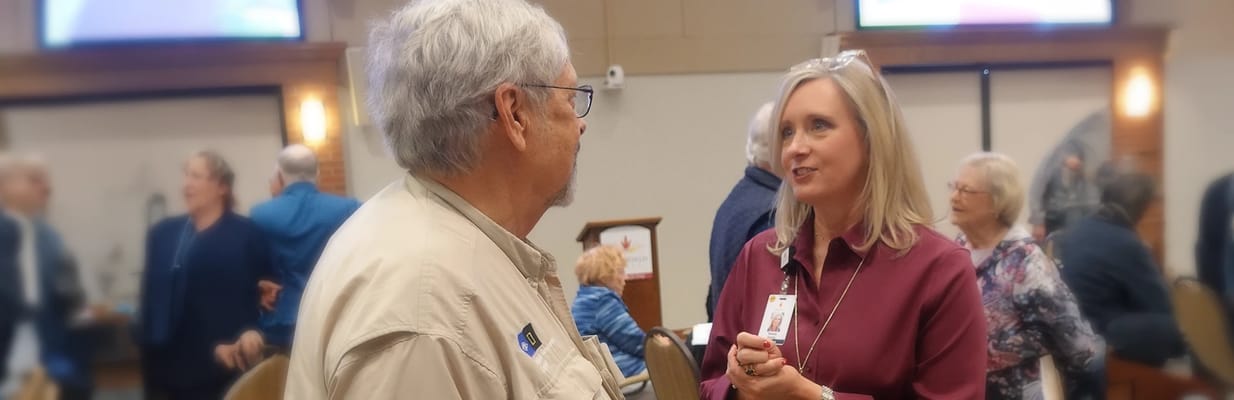 Residents interacting in a lively common area