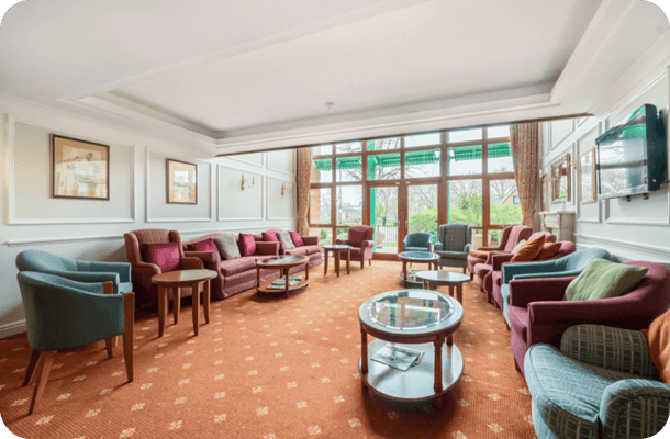 Common area with seating and large windows