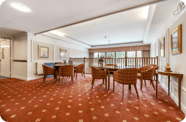 Cozy common area with seating and natural light