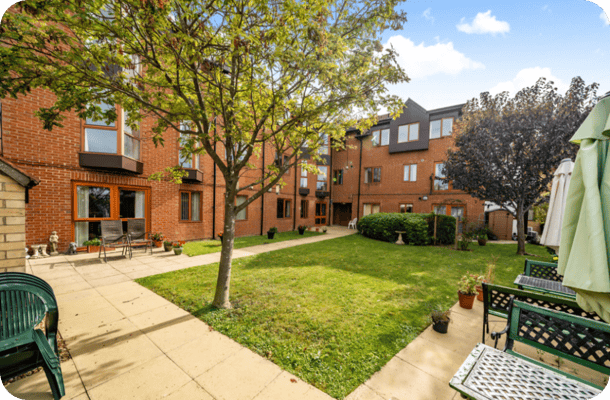 Outdoor courtyard with seating and greenery