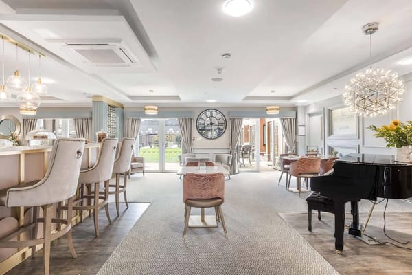 Elegant common area with seating and piano