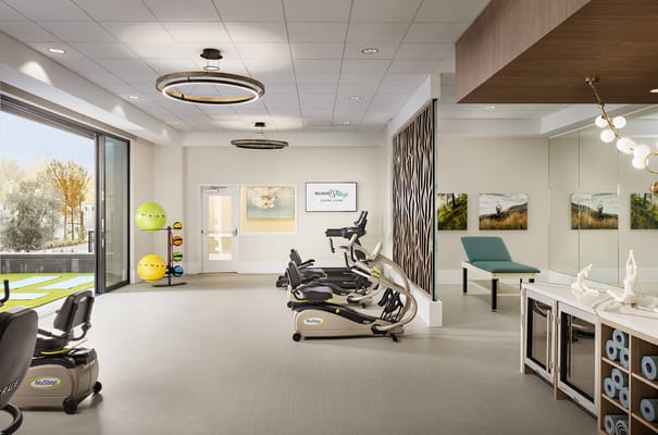 Interior view of a fitness area with exercise equipment
