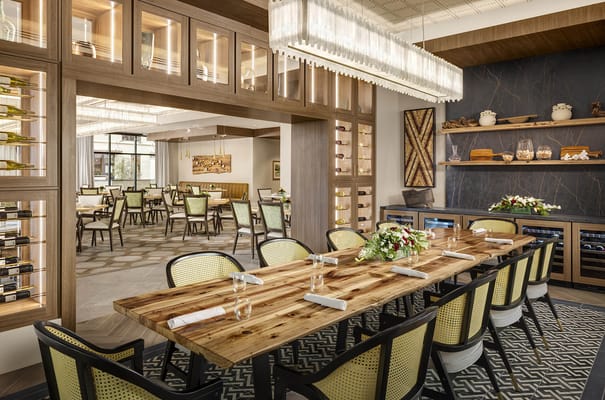 Elegant dining room with a long wooden table and modern decor