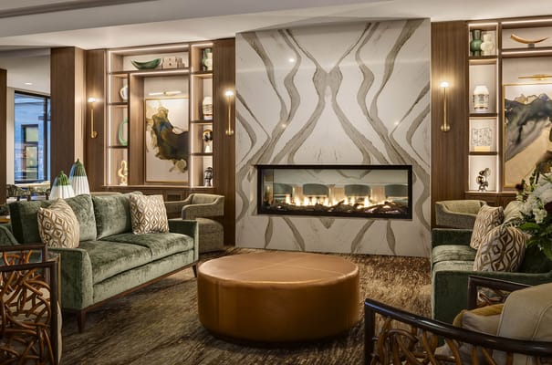 Cozy common area with seating and a fireplace