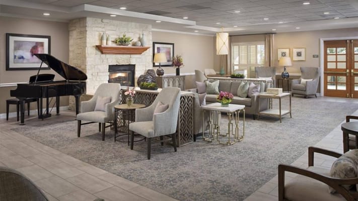 Comfortable common area with seating and fireplace