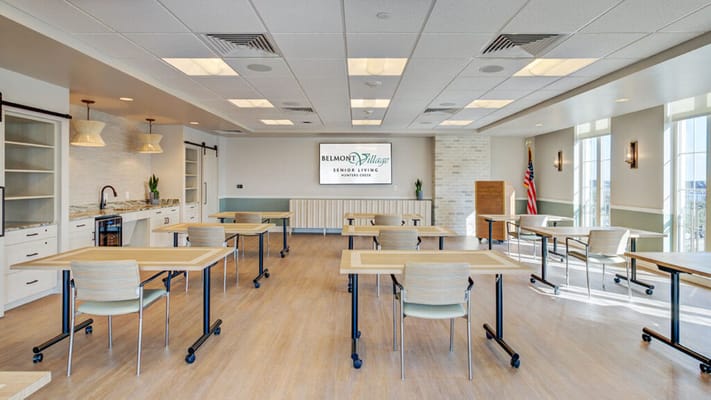 Bright common area with tables and chairs