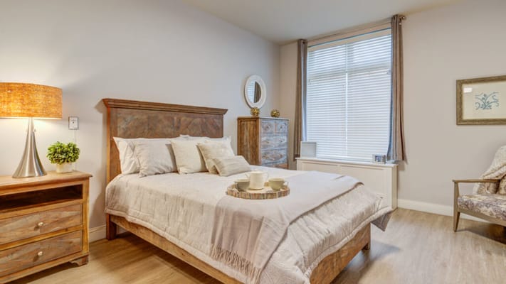 Cozy private bedroom with a bed and decorative elements