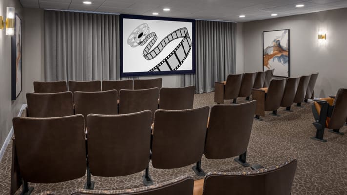 Interior view of a movie theater room with seating