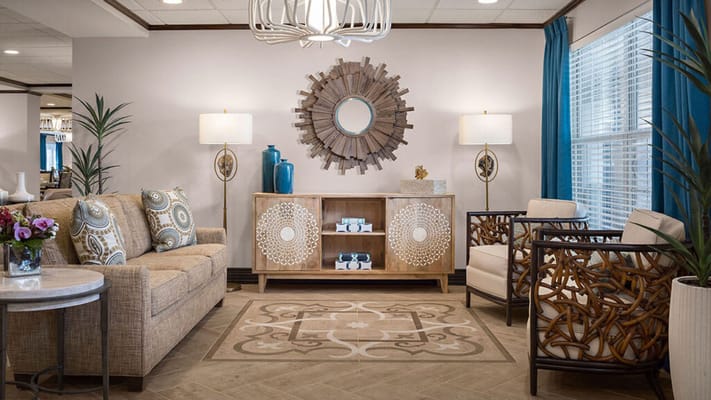 Interior lounge area with seating and decorative accents