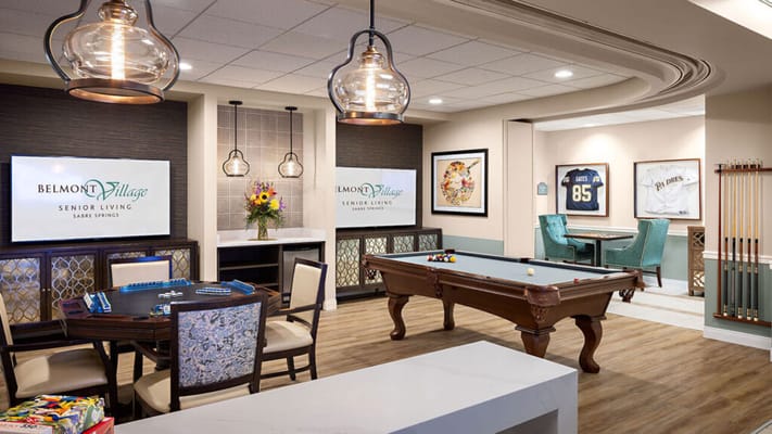 Bright common area with billiards and decor