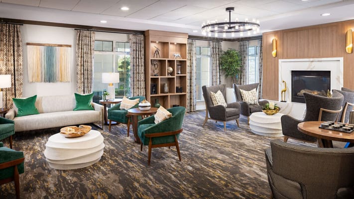 Bright common area with comfortable seating and decor