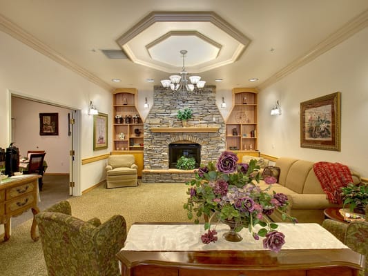 Cozy common area with a fireplace and seating