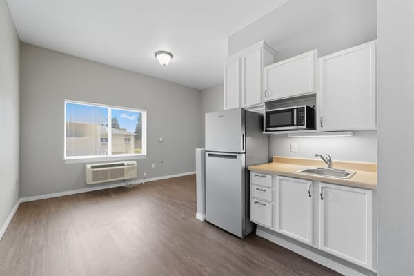 Bright and modern kitchenette in a senior living unit