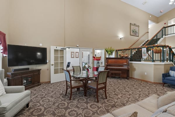 Common area with seating and a piano