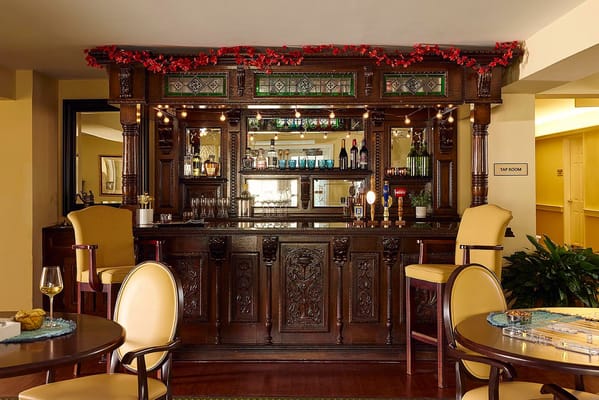 Interior view of a bar area with wooden decor