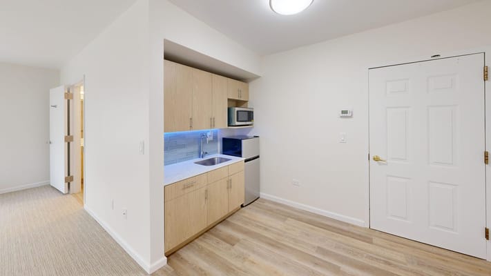 Compact kitchen in a resident unit