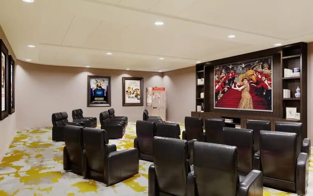 Comfortable seating in a lounge area with movie posters
