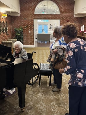 Residents enjoying music in a common area