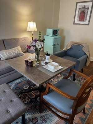 Cozy interior lounge area with a sofa and decor