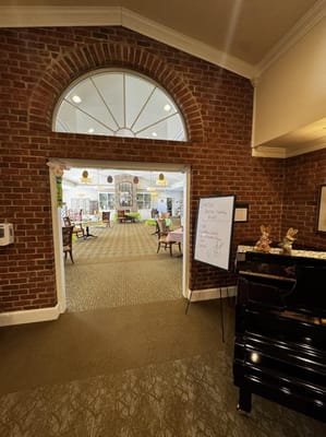 Interior view of a common area with seating and activities