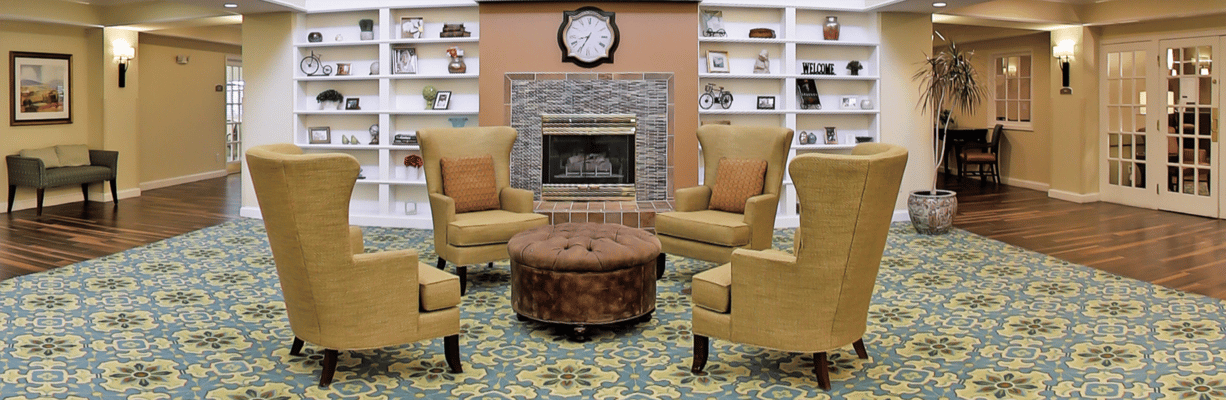 Common area with seating and fireplace