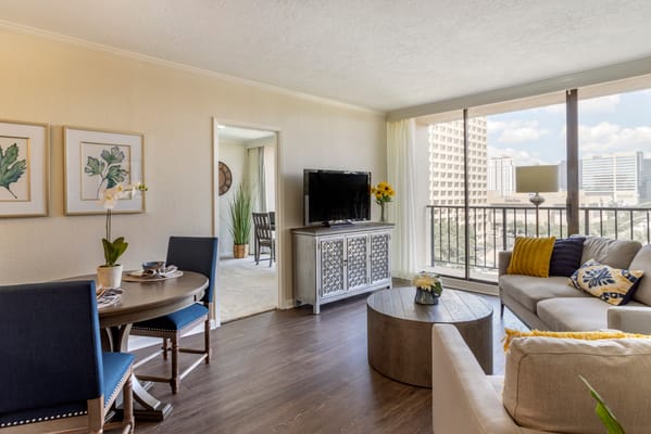 A cozy and inviting living room in a senior living facility