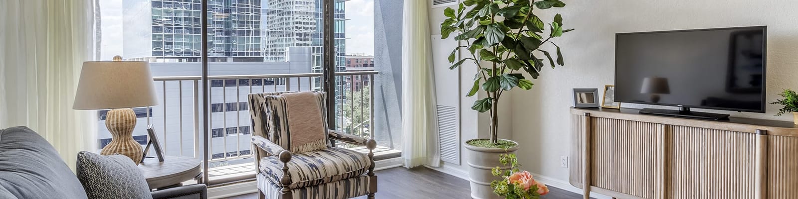 Bright common area with a view and plants