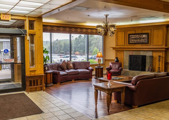 Comfortable lounge area with seating and windows