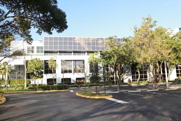 Exterior view of Avalina Senior Living with landscaping