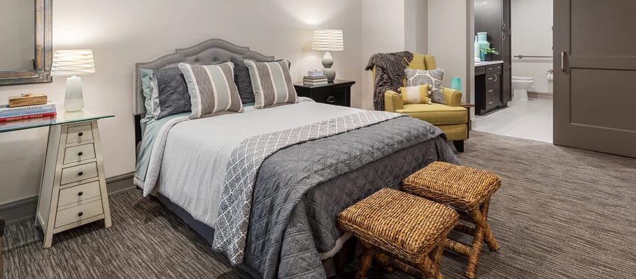 A well-decorated resident bedroom in an assisted living facility
