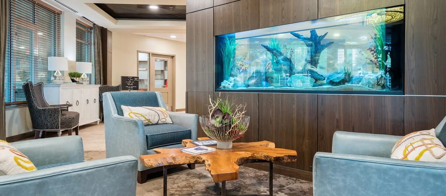 Interior common area with comfortable seating and fish tank
