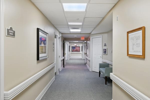 Interior hallway with doors to rooms and decor