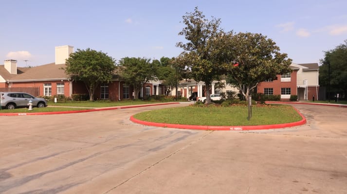 Entrance of The Gardens of Bellaire senior living facility.