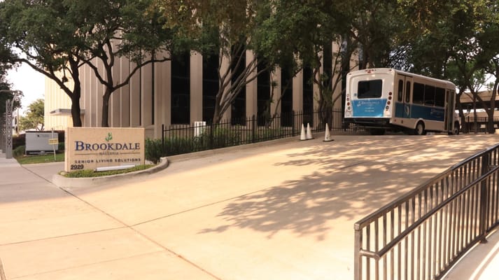 Exterior view of Brookdale Galleria with facility bus