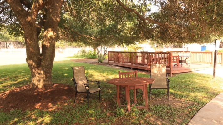 Outdoor seating area with a table and chairs