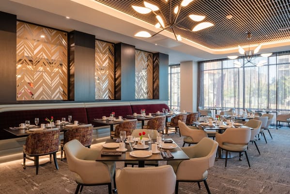 Modern dining room setup with elegant table settings